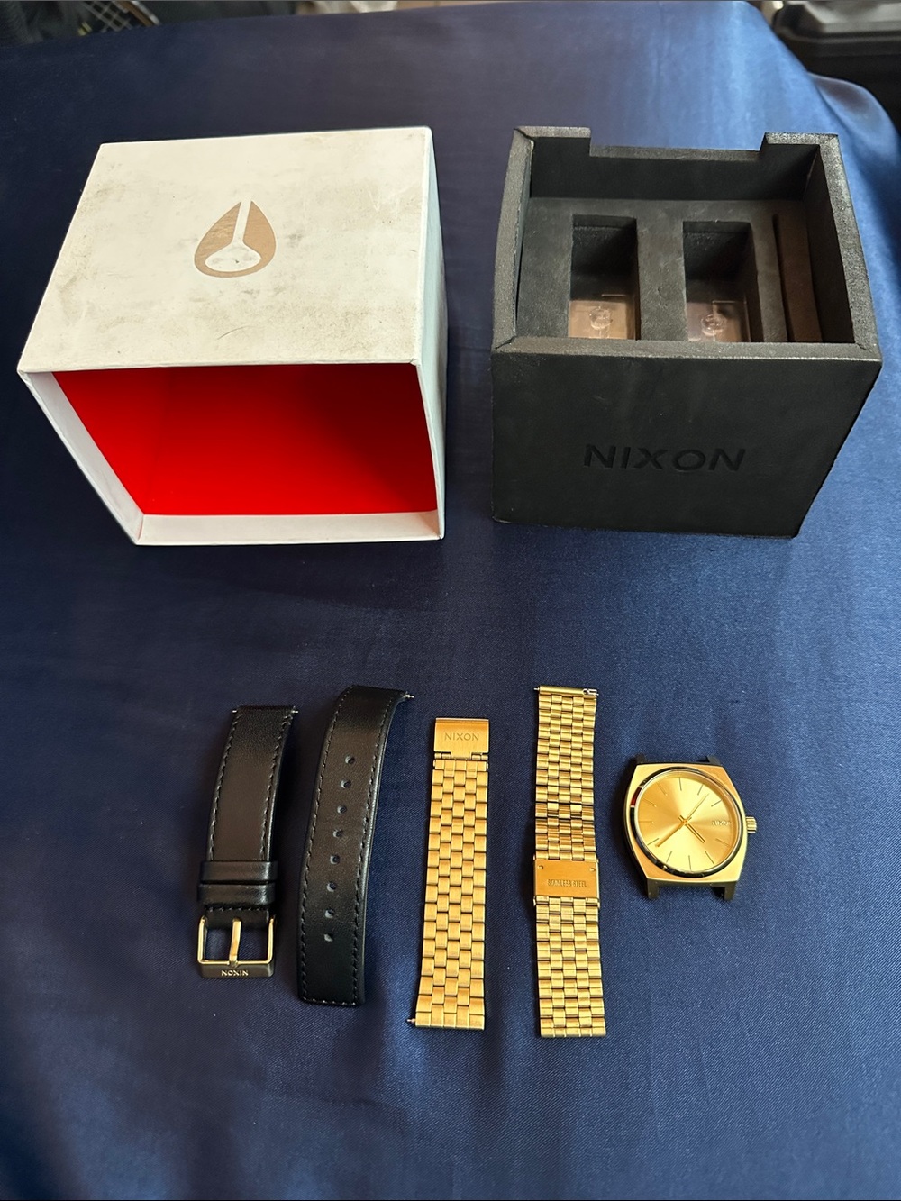 Nixon Gold Watch Head with Black Leather and Gold Metal Straps